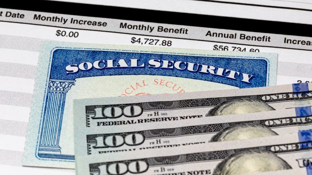 social security card and 100 dollar bills
